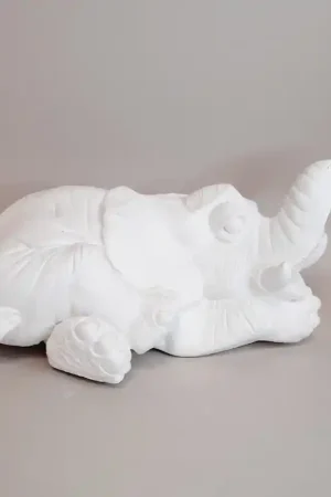 FIGURA DE ESCAYOLA ELEFANTE ACOSTADO Auténtico